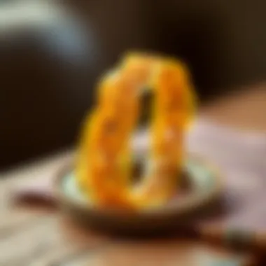 A close-up view of a beautifully crafted beeswax bracelet showcasing intricate patterns.