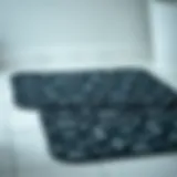 Elegant black patterned bath mat on a tiled floor