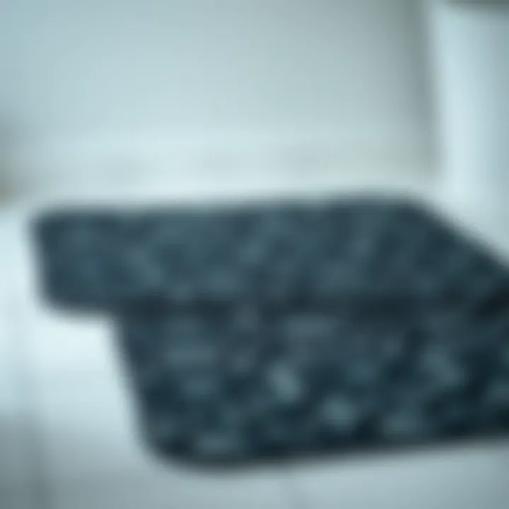 Elegant black patterned bath mat on a tiled floor