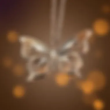 Close-up of personalized initials on butterfly necklace