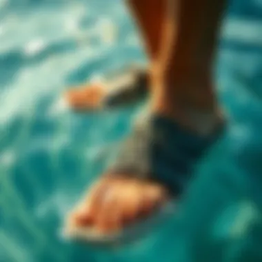 Close-up of swim shoes in water