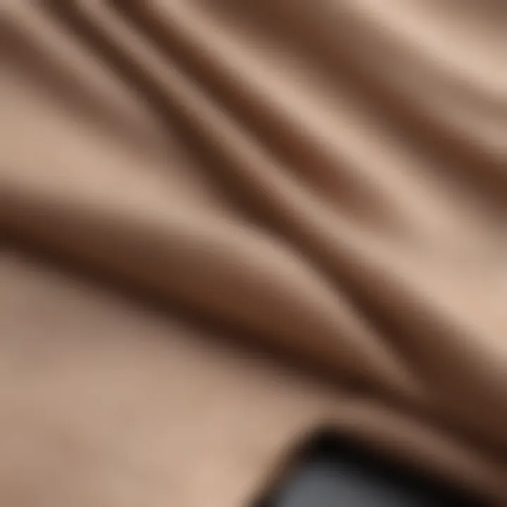 Close-up of fabric textures used in high-waisted pants with slits