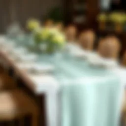 Elegant mint green satin table runner on a beautifully set dining table