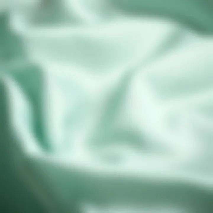 Texture of Mint Green Satin Fabric Close-up of mint green satin fabric showcasing its texture and sheen