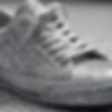 Close-up view of sparkling silver glitter sneakers highlighting craftsmanship