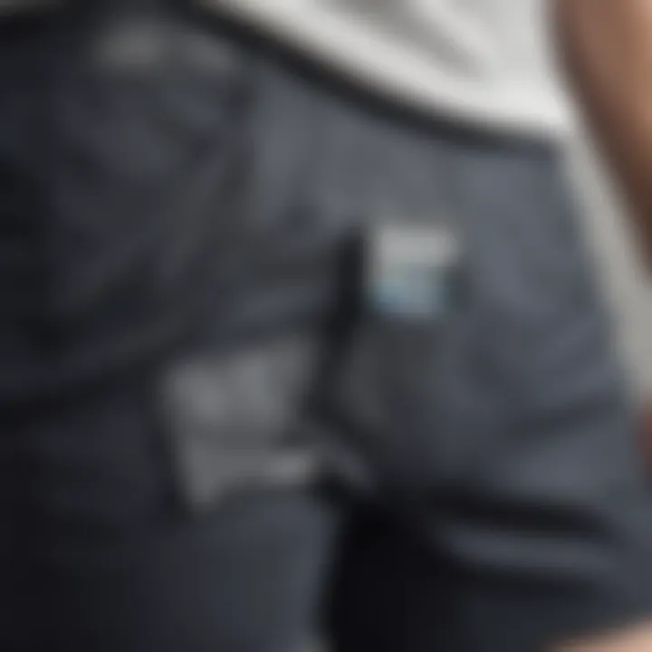 Close-up of a phone securely placed in a pocket of shorts